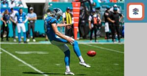 A businessman punting a football symbolizes what NC sports betting regulators have done with pick 'em-style fantasy brands for now