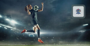 Woman soccer player receives a pass while jumping signifying the return of The Soccer Tournament To Cary