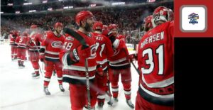 Carolina Hurricanes players celebrating a victory. BetMGM will feature prominently on Hurricanes TV broadcasts after extending deal with the NHL.