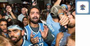 Tar Heels fans celebrating, signifying NC sports bettors' excitement as online sports betting launch nears