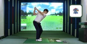 Man using a golf simulator signifying potential launch of Skill Money Games in North Carolina